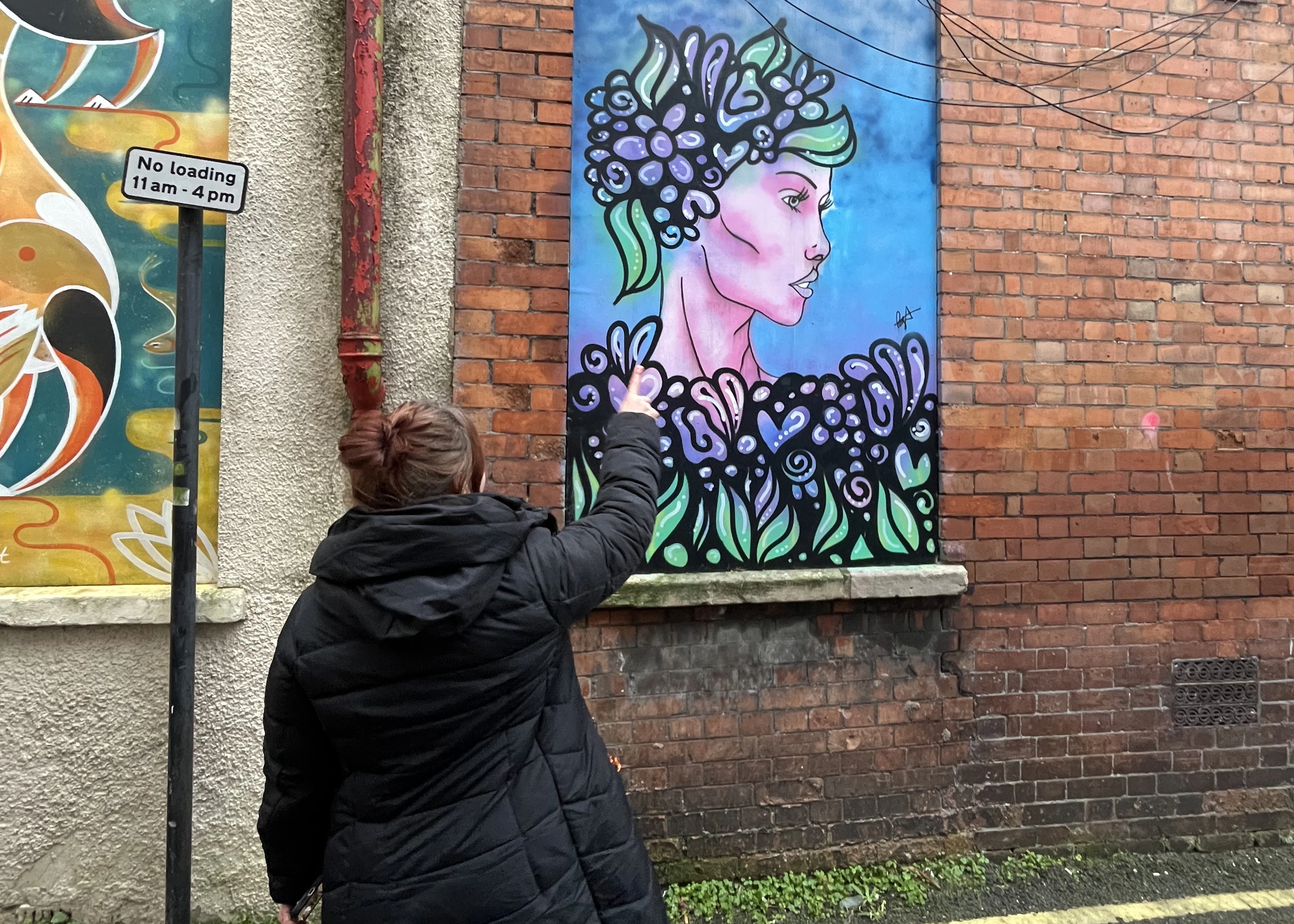 Painting on the wall in an alleyway in Weston-super-Mare.