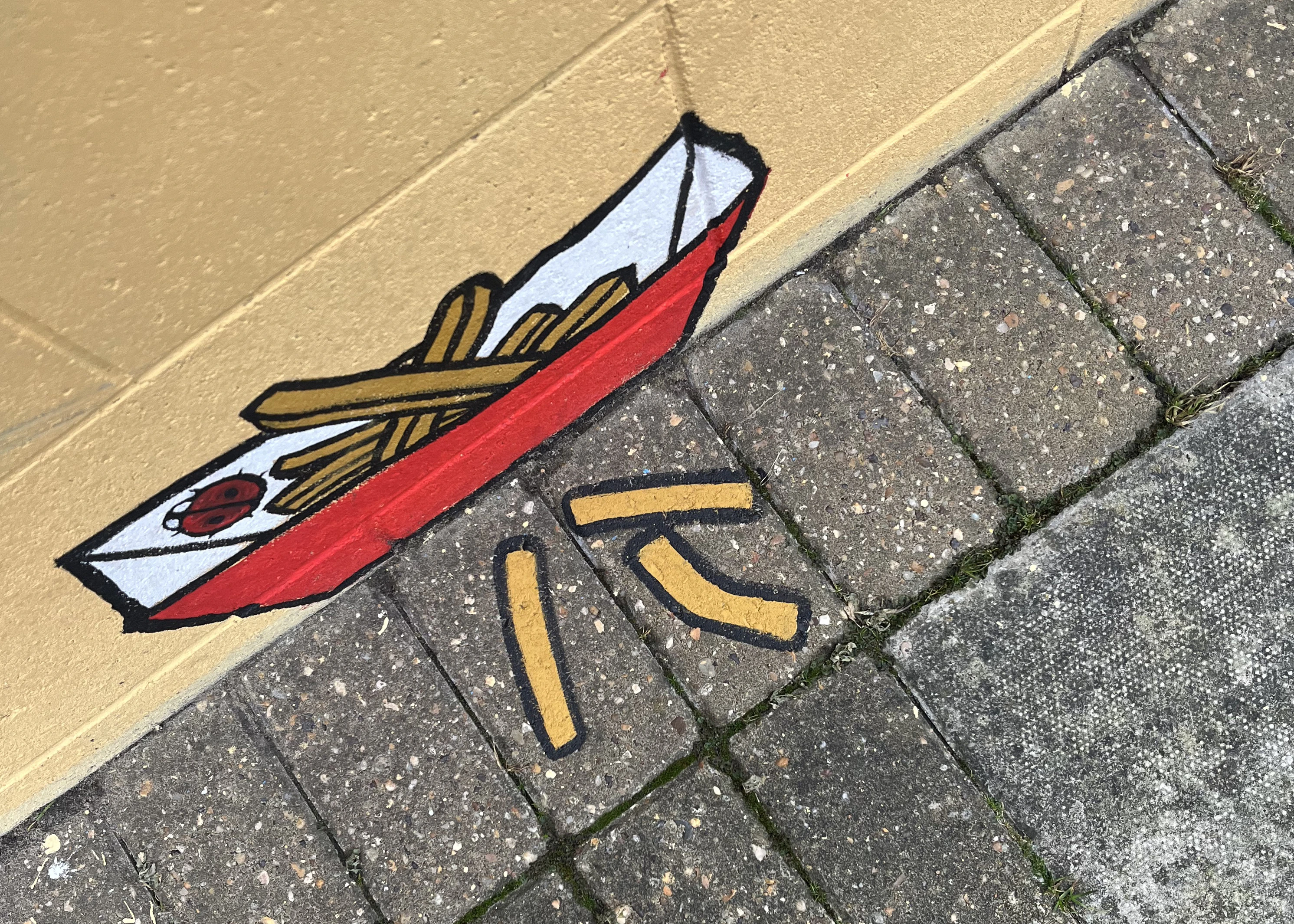 Chips painted on the wall by a street artist in Weston-super-Mare.
